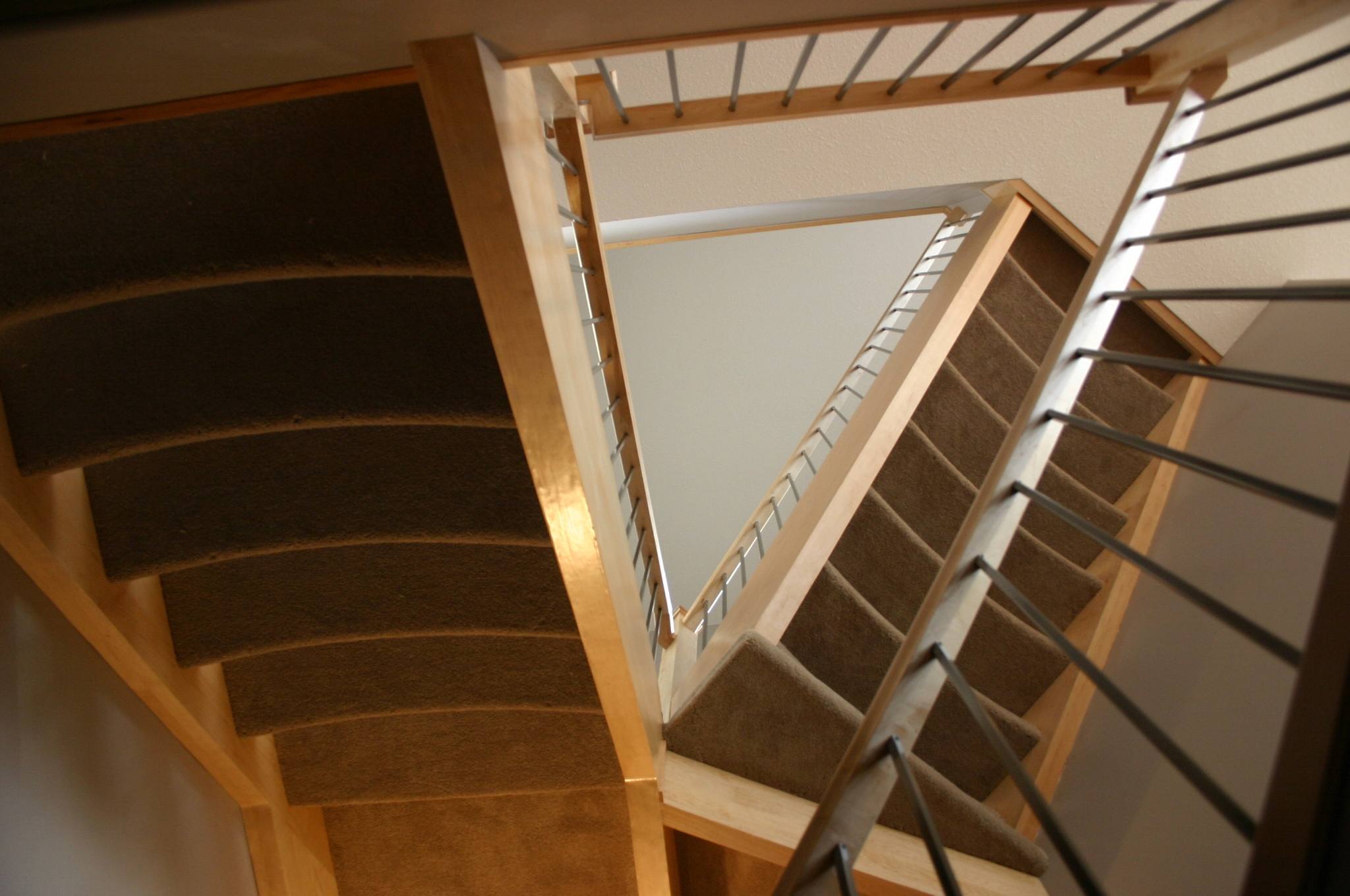 Curved landing and straight stair composition
